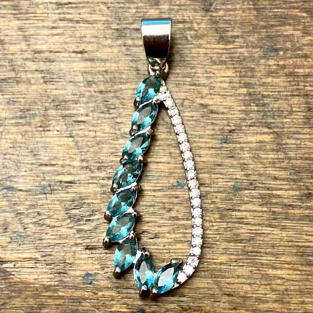 5/$25 pendant with aquamarine stones and mini diamonds.